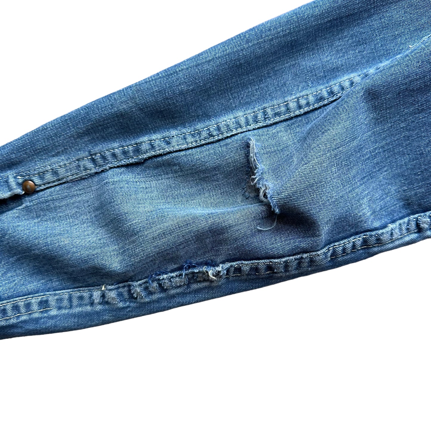 Tear in Left Elbow of Vintage Pleated Type II Style Denim Jacket SZ M  | Vintage Denim Workwear Seattle | Seattle Vintage Denim