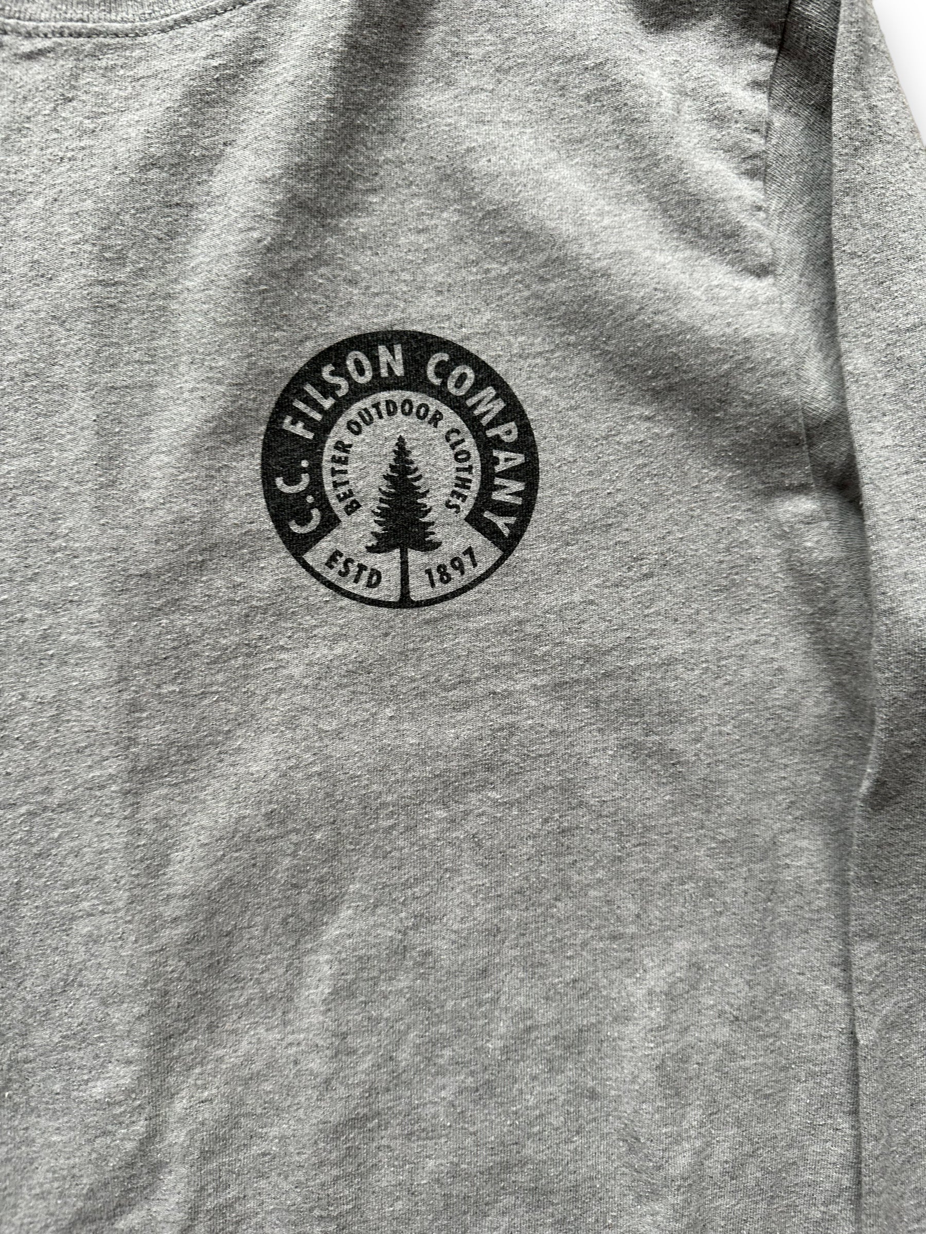 Front Graphic Detail on Filson Long Sleeve Heather Grey Tee SZ XS  |  Barn Owl Vintage Goods | Filson Graphic Tees Seattle