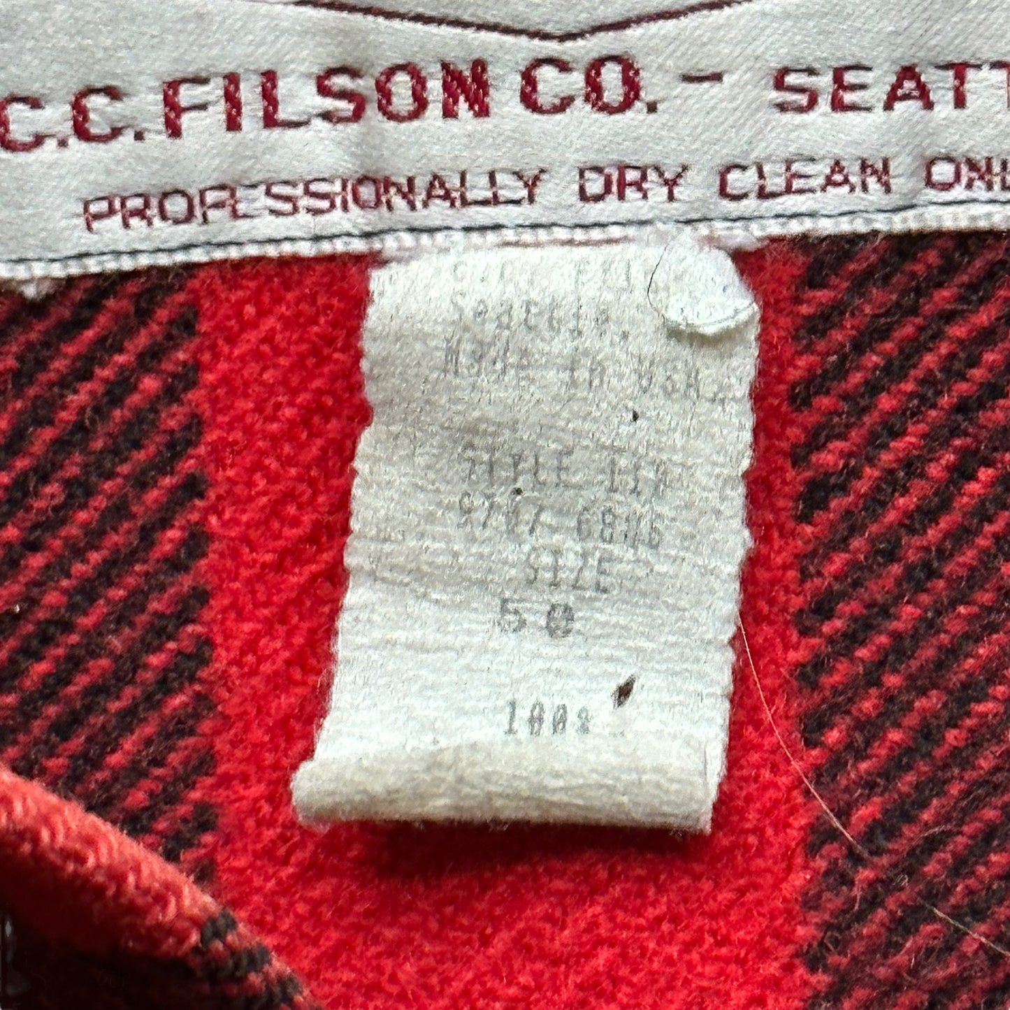Tag View of Vintage Visibly Repaired 90s Era Filson Mackinaw Cruiser Size 50 |  Barn Owl Vintage Goods | Vintage Filson Workwear Seattle