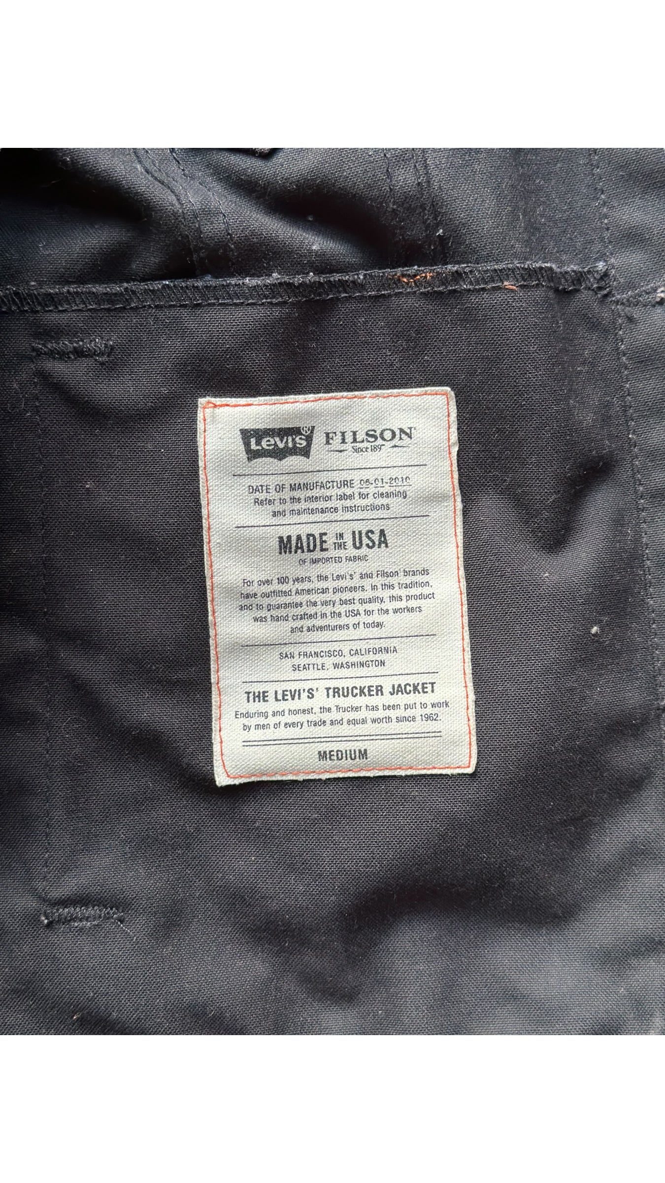 Tag View on Black Levis X Filson Type III Trucker Jacket SZ Medium |  Filson Levis Trucker Jacket | Vintage Workwear Seattle