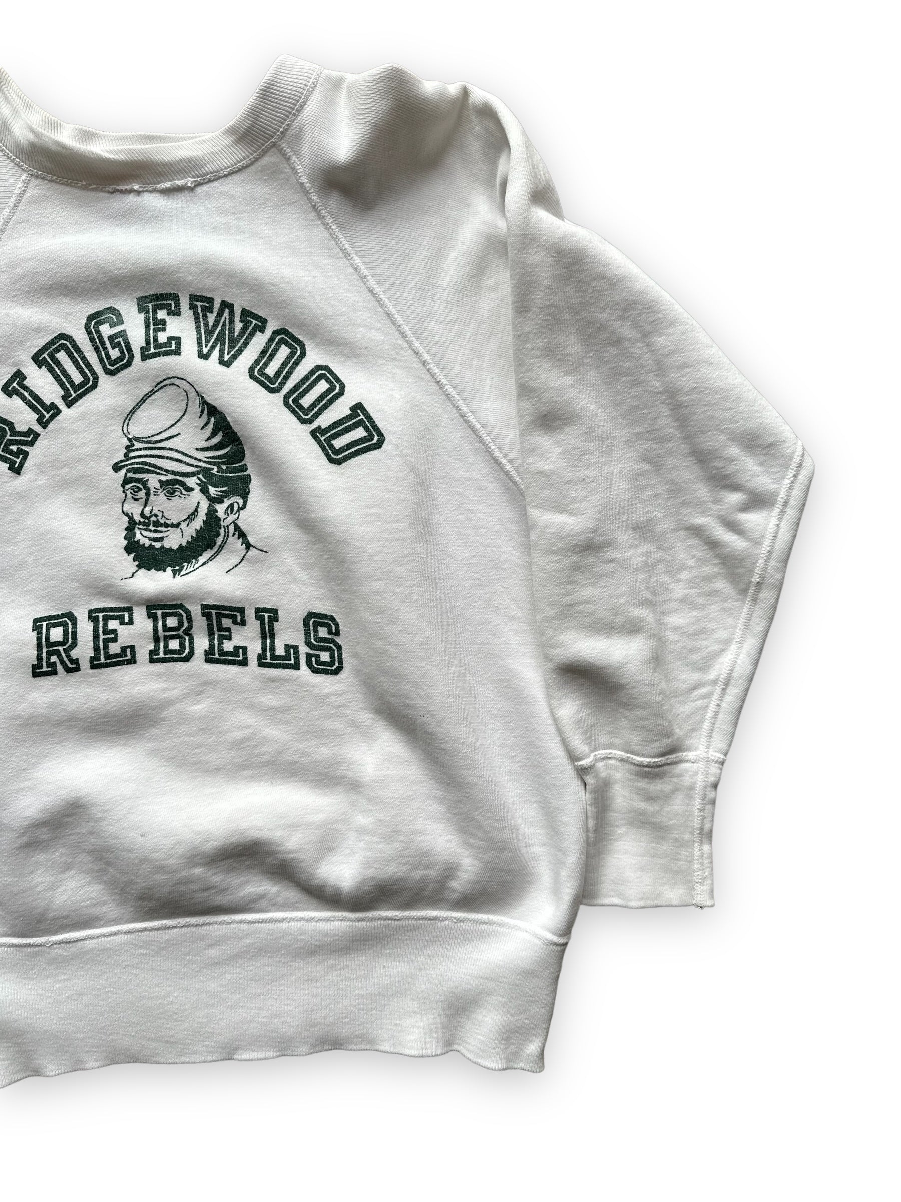 Left Front View on Vintage Champion Running Man Ridgewood Rebels Crewneck Sweatshirt | Vintage Champion Sweatshirt Seattle | Barn Owl Vintage Clothing