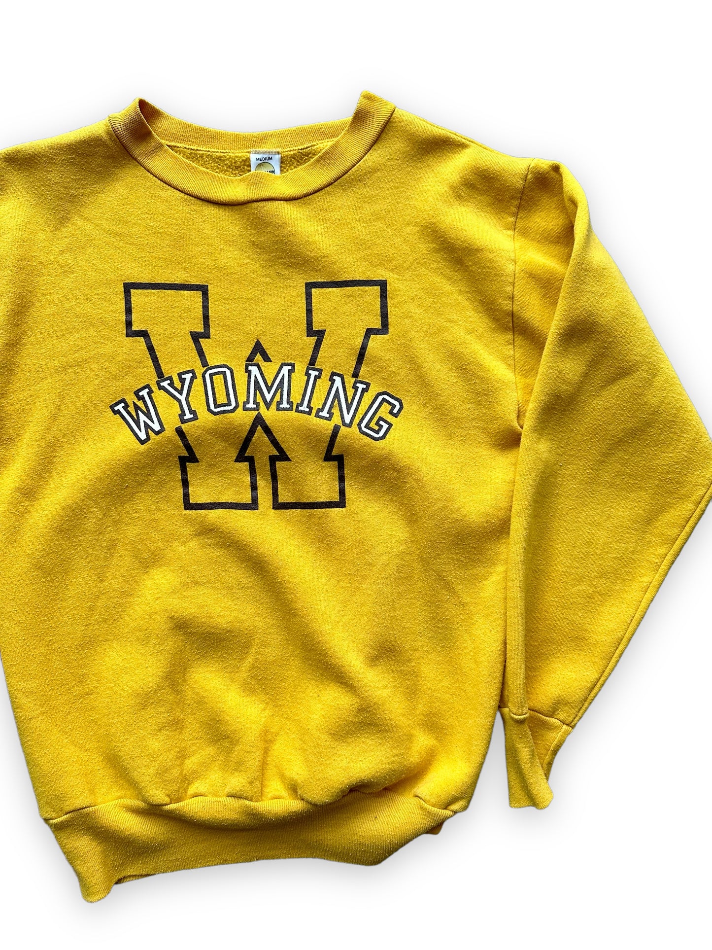 Front Left View of Vintage Yellow Wyoming Crewneck Sweatshirt SZ M | Vintage Crewneck Sweatshirt Seattle | Barn Owl Vintage Seattle