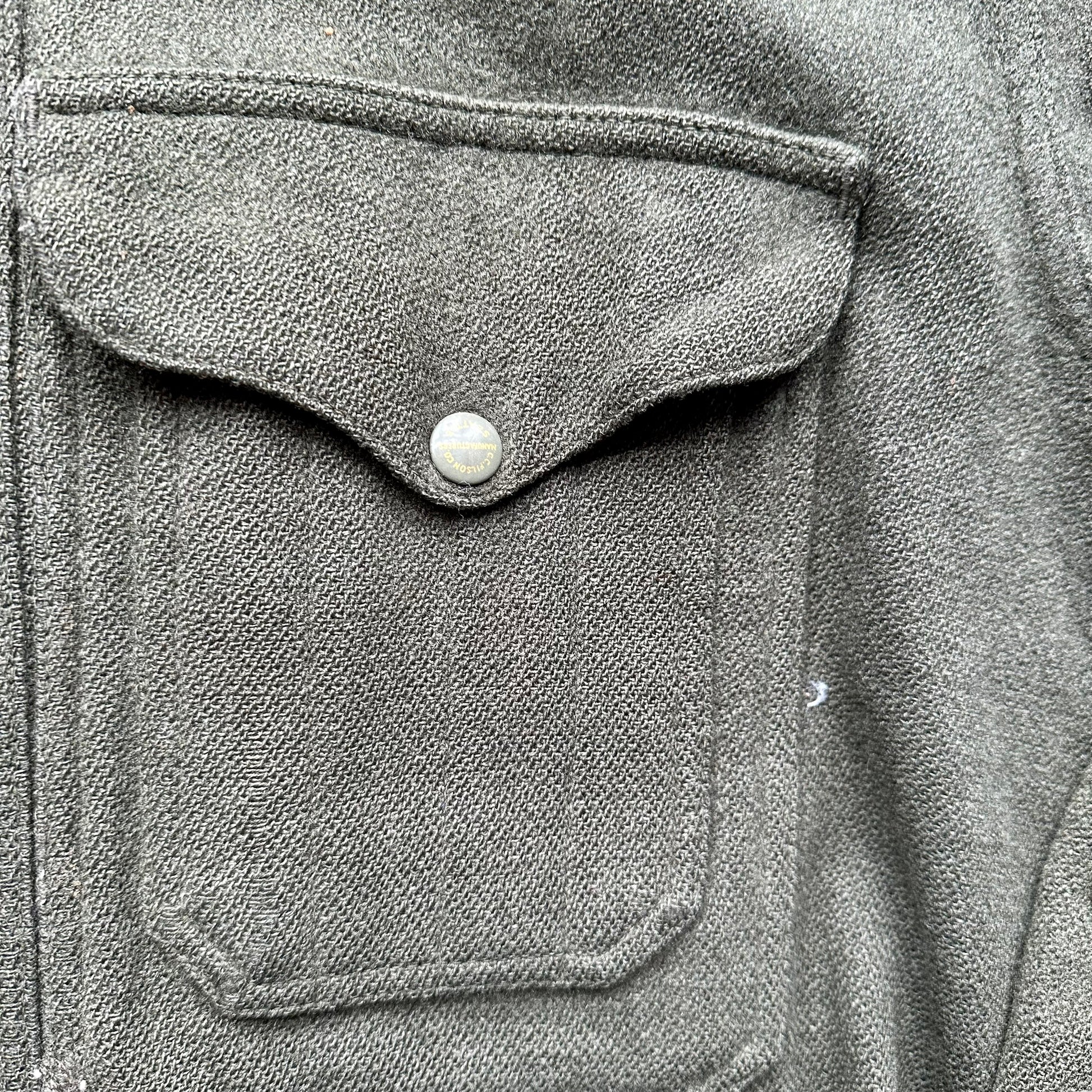 Upper Front Left Pocket on Vintage Union Made Era Visibly Repaired Filson Forestry Cloth Cruiser SZ 44 |  Barn Owl Vintage Goods Seattle | Vintage Workwear Seattle