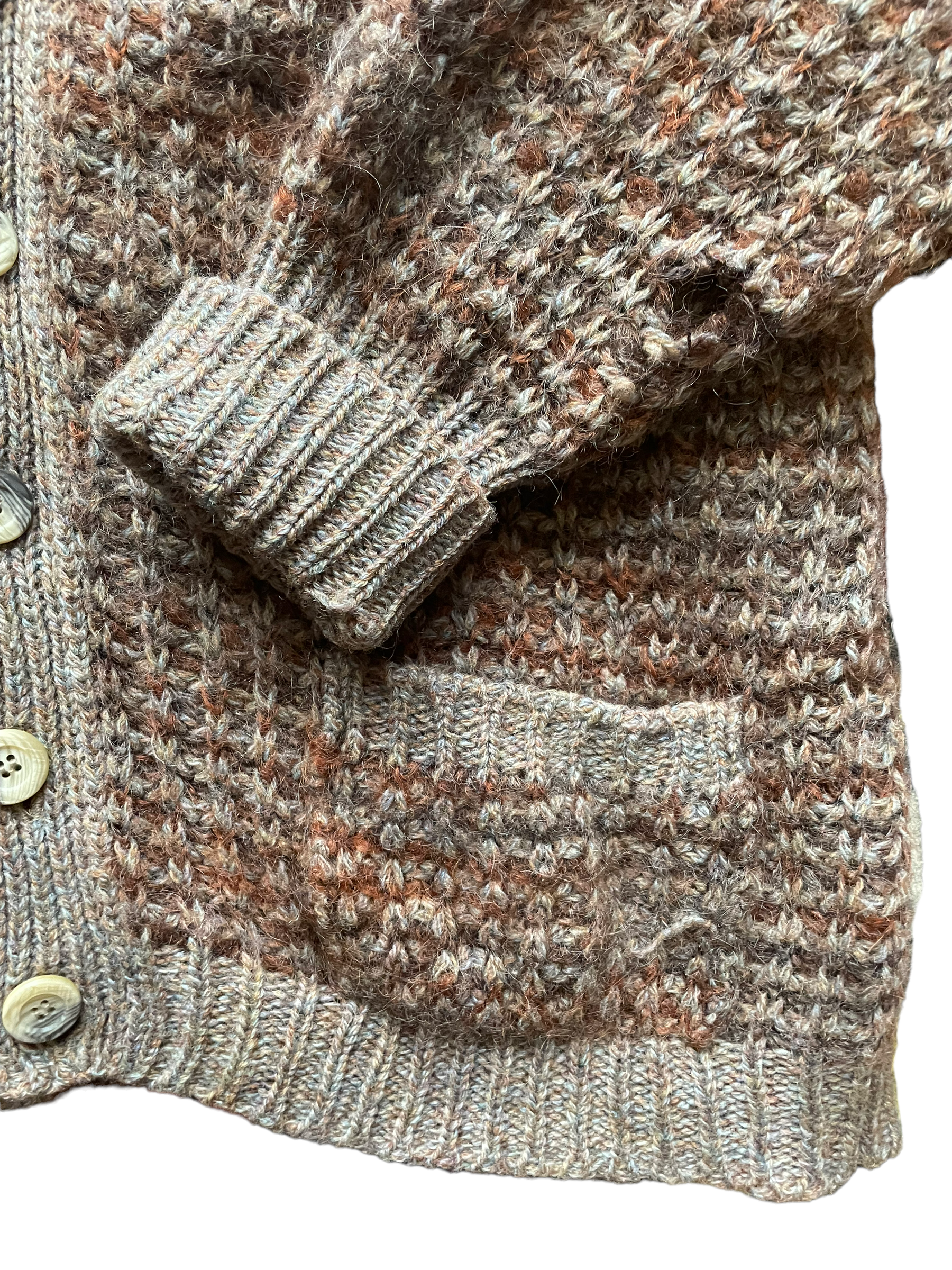 Vintage 1960s Shetland Wool Grampa Cardigan |  Barn Owl Vintage | Seattle Vintage Sweaters Close up view of left side pocket and sleeve. Hole visible on left sleeve.
