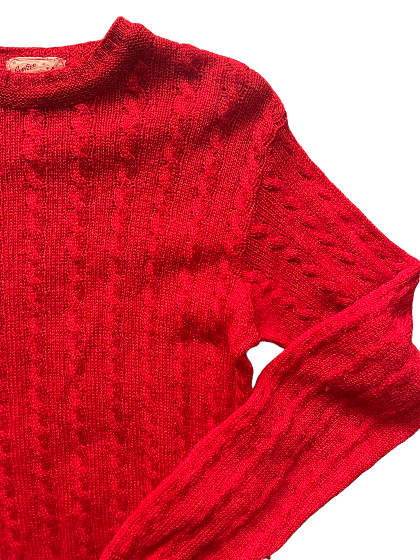 Vintage 1950s Jantzen Cable Knit Wool Sweater | Barn Owl Seattle | Seattle Vintage Sweaters Front left shoulder view.