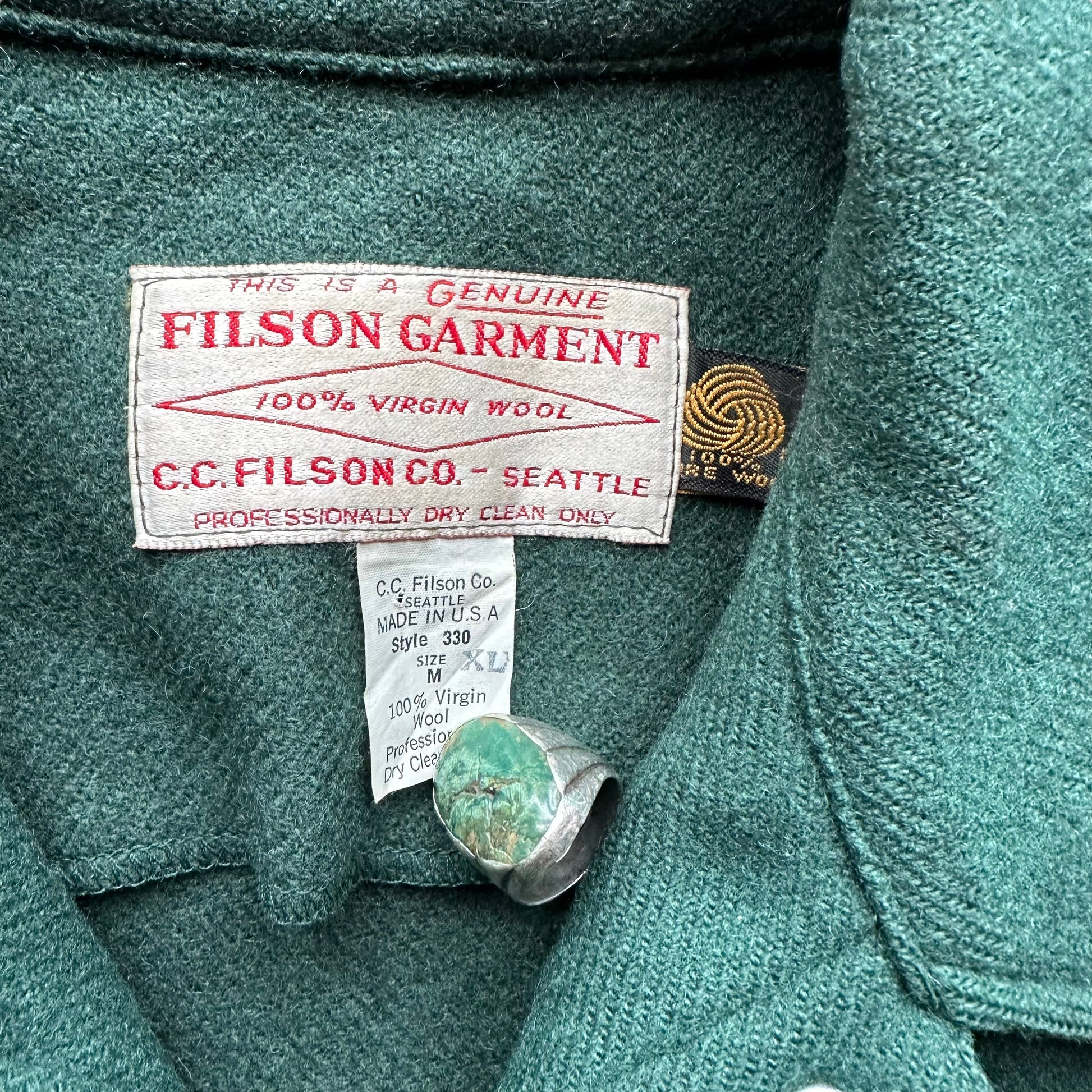 Tag View of Vintage Filson USFS Green Cape Coat SZ M XLong | Vintage Filson Forestry Cape Coat | Vintage Workwear Seattle