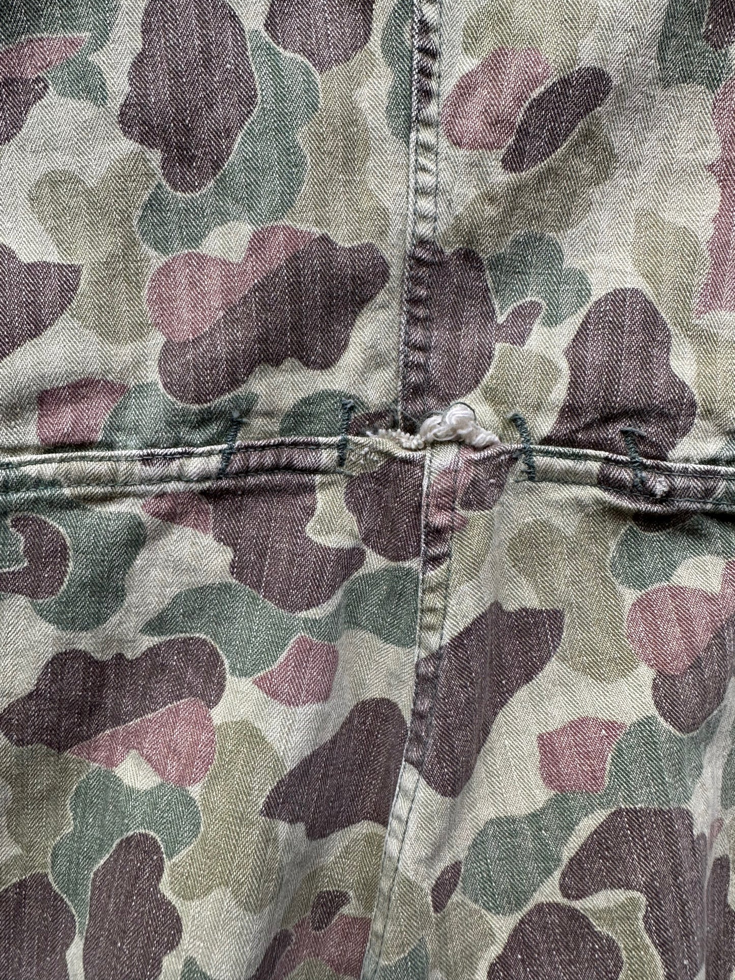 Small Hole in Seam of Vintage M-4395 HBT Frogskin Camo Coveralls SZ M | Vintage Frog Skin Camo Pants Seattle | Barn Owl Vintage Workwear