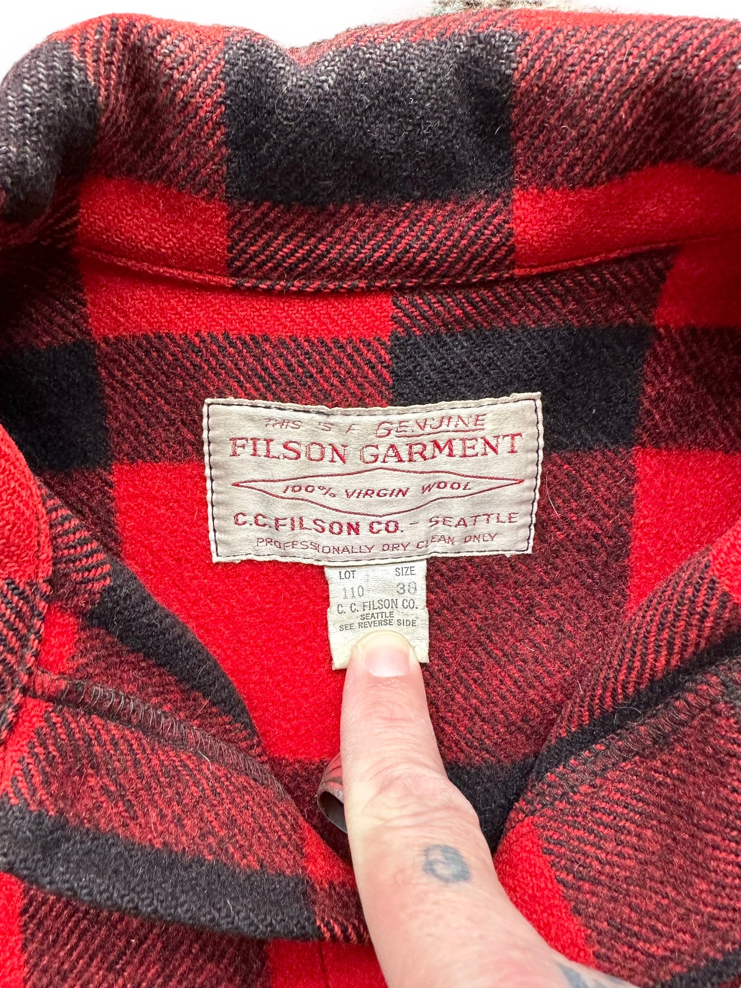 Tag View of Vintage Filson Red and Black Wool Cruiser Size 38 |  Barn Owl Vintage Goods | Vintage Filson Workwear Seattle