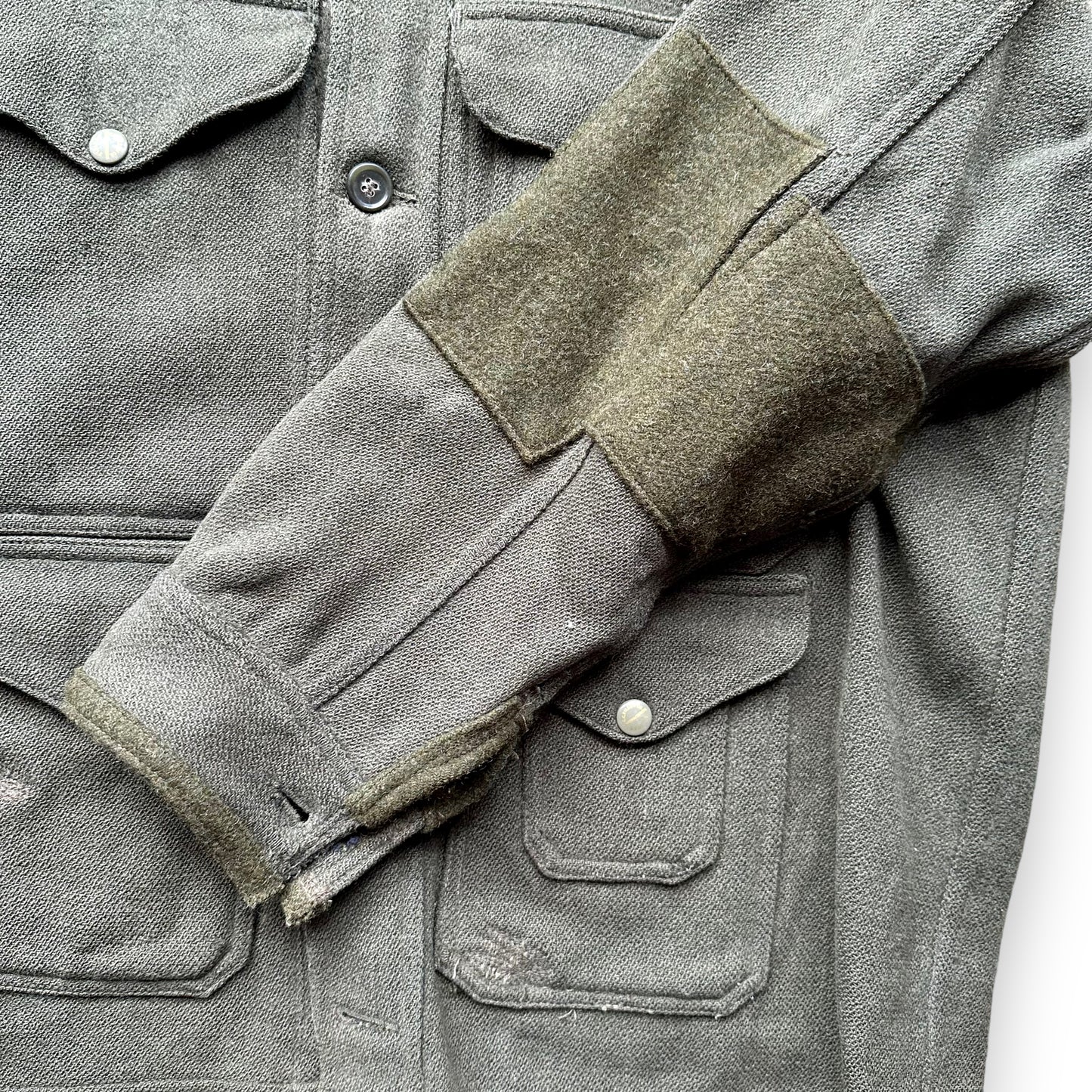 Repaired Left Sleeve on Vintage Union Made Era Visibly Repaired Filson Forestry Cloth Cruiser SZ 44 |  Barn Owl Vintage Goods Seattle | Vintage Workwear Seattle