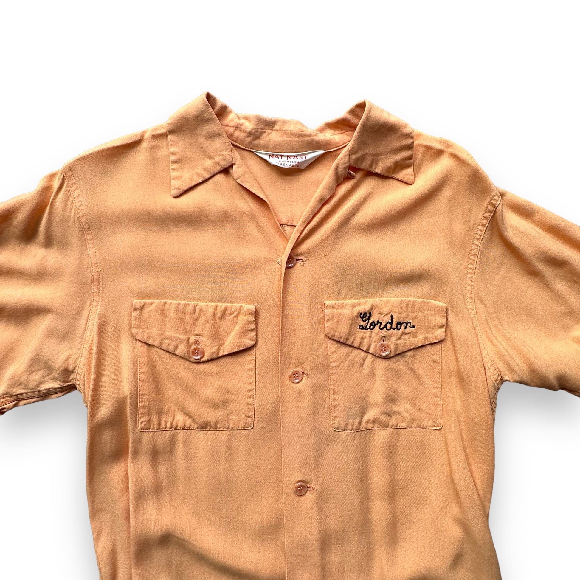 Upper Front View of Vintage Nat Nast Peach Colored Chainstitched Bowling Shirt SZ M | Vintage Bowling Shirt Seattle | Barn Owl Vintage Seattle