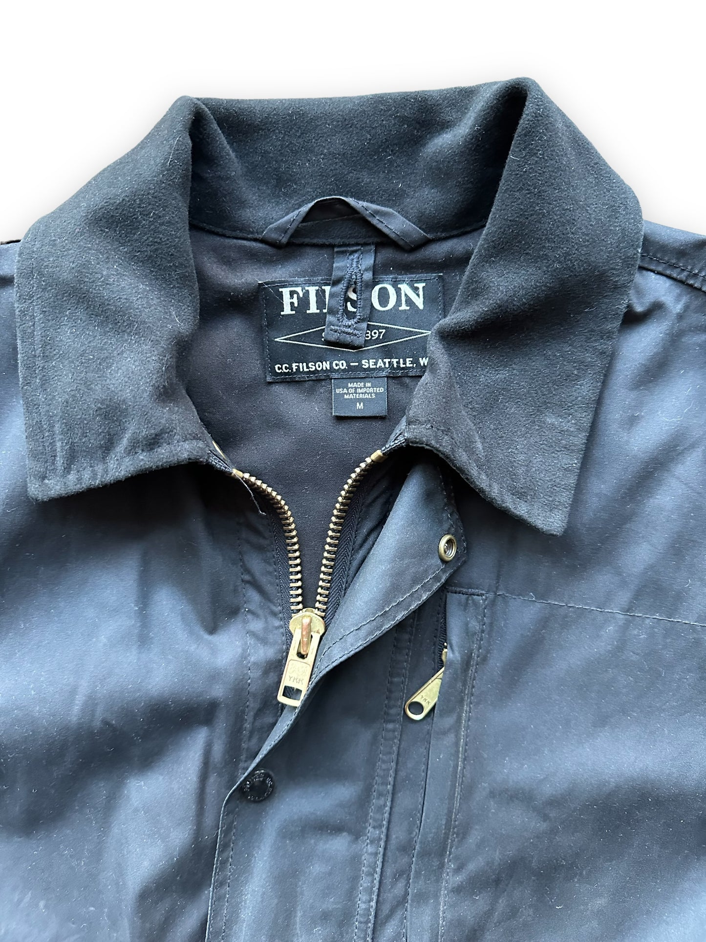 Tag View of Filson Black Cover Cloth Mile Marker Jacket With Hood SZ M |  Barn Owl Vintage Goods | Vintage Workwear Seattle