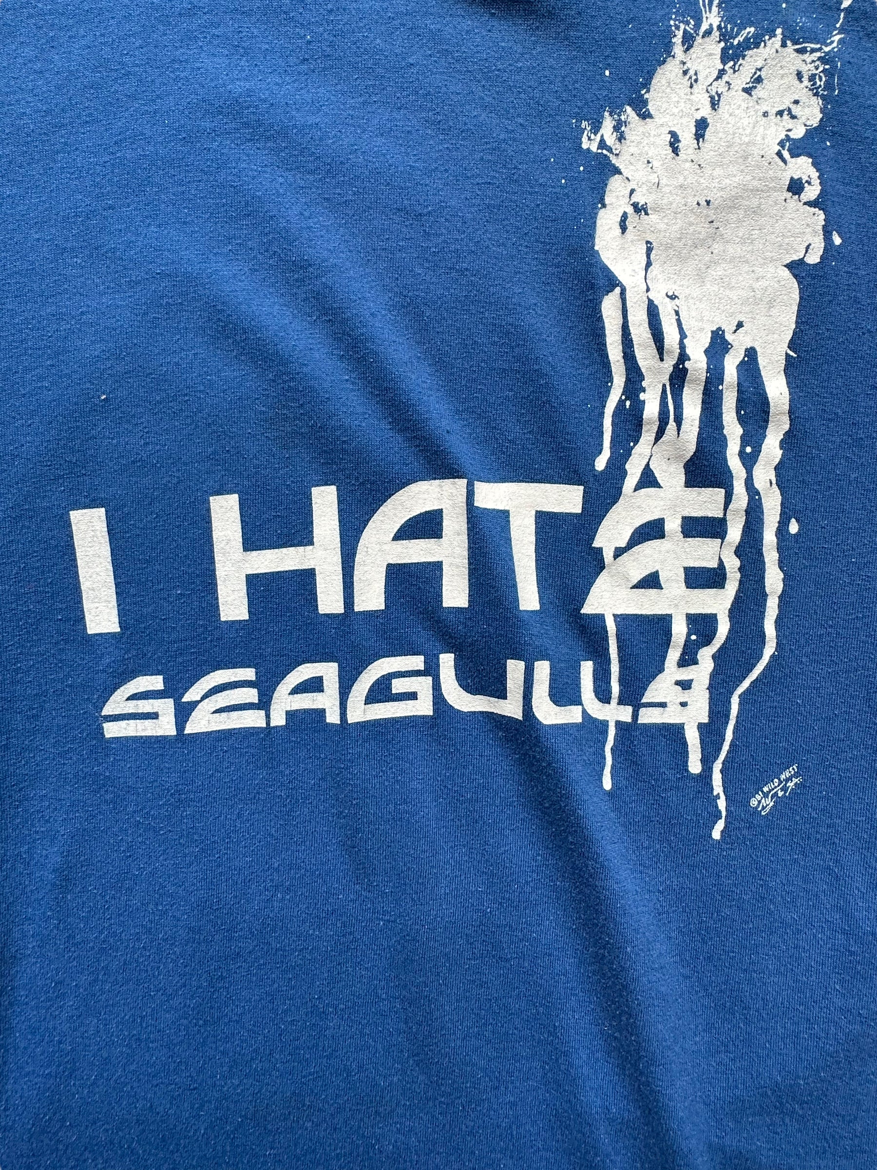 Graphic close up shot of Vintage Blue I Hate Seagulls Tee SZ L | Vintage T-Shirts Seattle | Barn Owl Vintage Tees Seattle