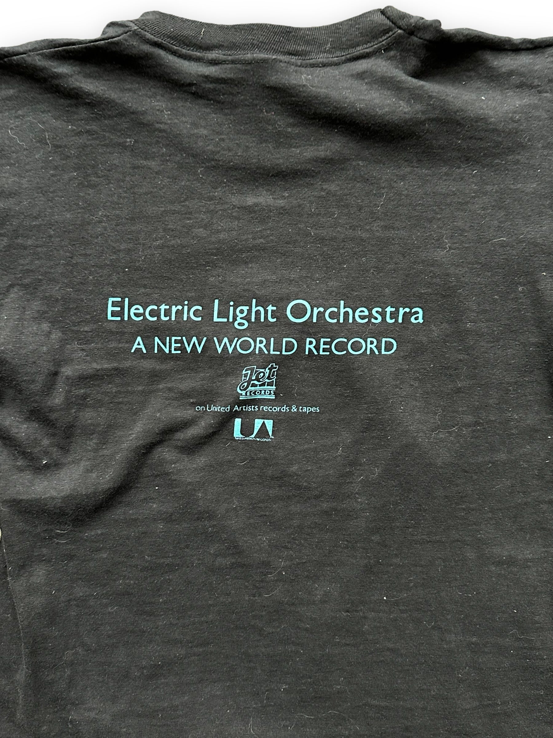 Rear Detail on Vintage Electric Light Orchestra A New World Record Promotional Tee SZ M  |  Vintage Jeff Lynne ELO Tee | Barn Owl Vintage Clothing Seattle