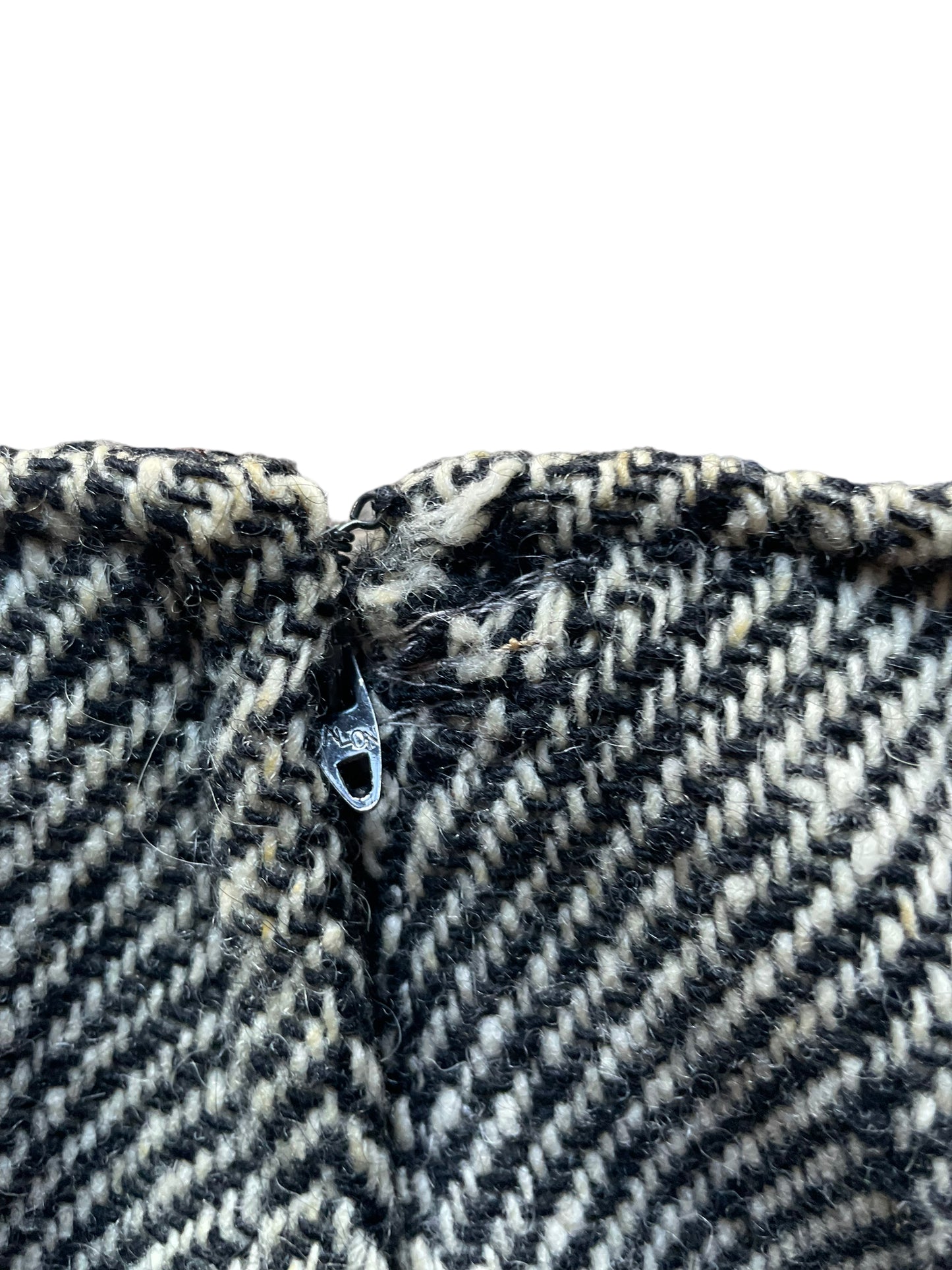 Mended area near zipper view of Vintage 1950s Suggi of California Wool Cigarette Pants