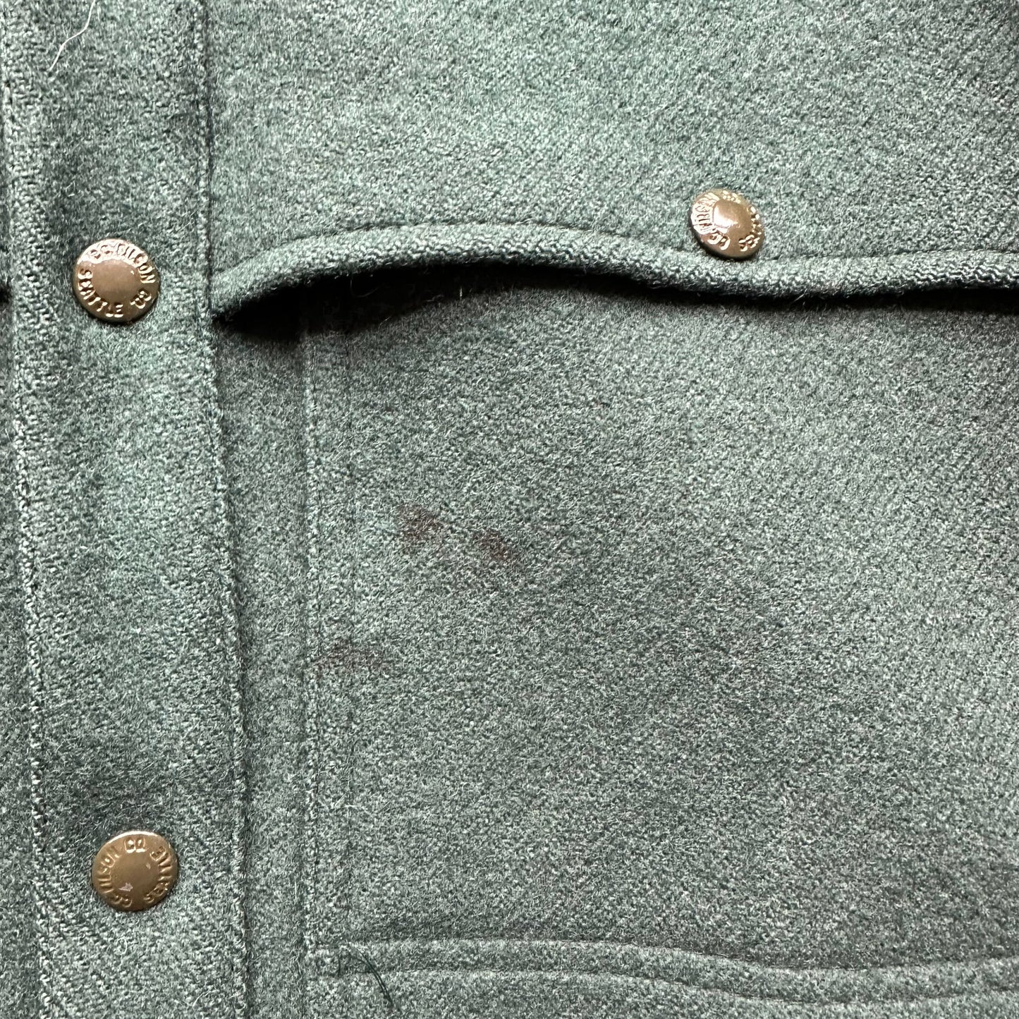 Blemish on Top Left Pocket on Vintage Filson USFS Green Cape Coat SZ M XLong | Vintage Filson Forestry Cape Coat | Vintage Workwear Seattle