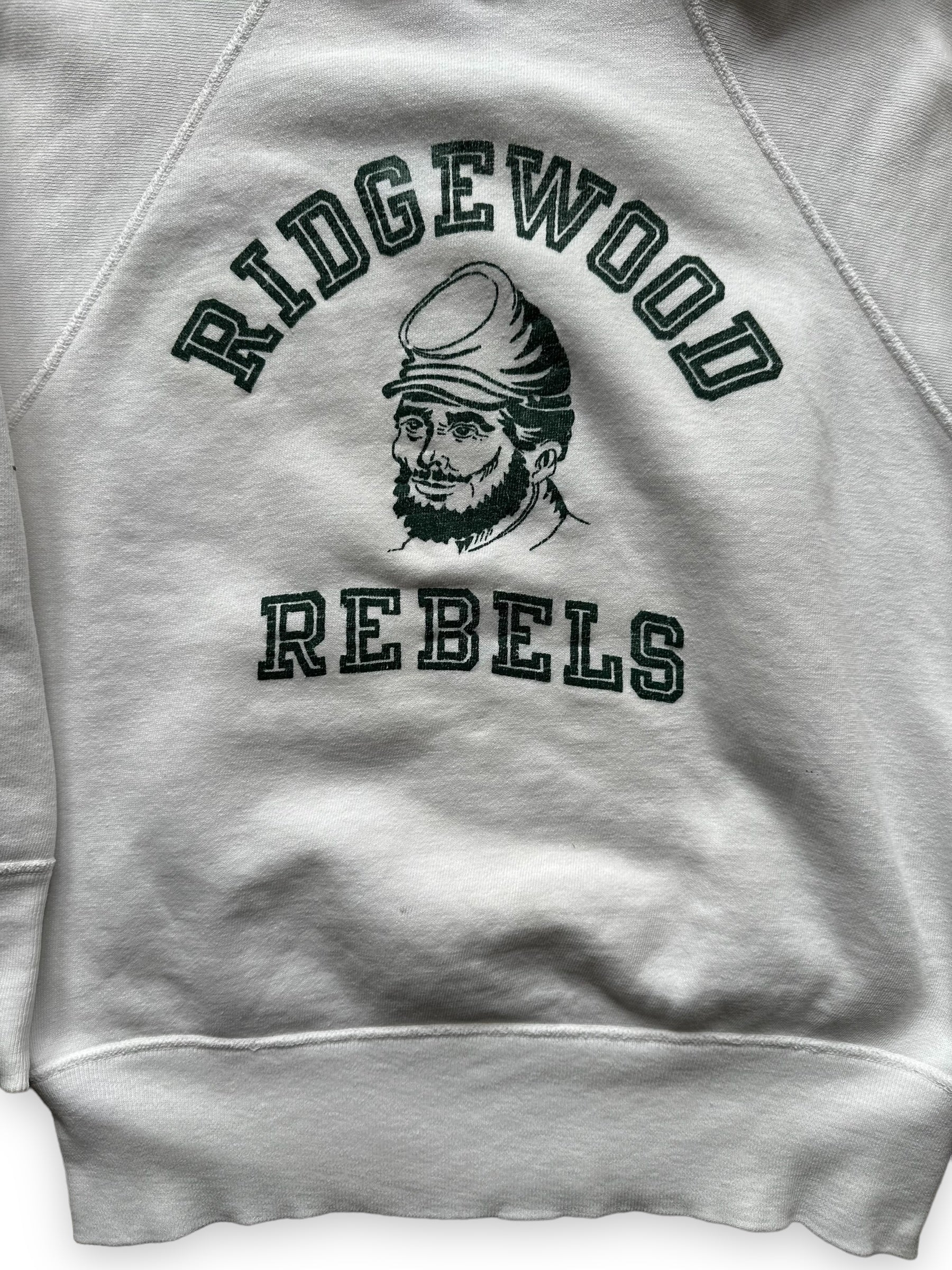 Front Detail on Vintage Champion Running Man Ridgewood Rebels Crewneck Sweatshirt | Vintage Champion Sweatshirt Seattle | Barn Owl Vintage Clothing